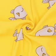 Интерлок с рисунком - рыбки на желтом фото